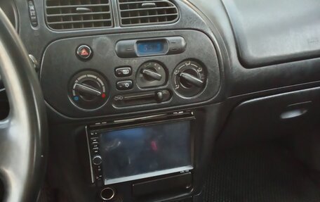 Mitsubishi Mirage VI рестайлинг, 2001 год, 120 000 рублей, 8 фотография