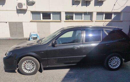Mazda 323, 2001 год, 315 000 рублей, 9 фотография