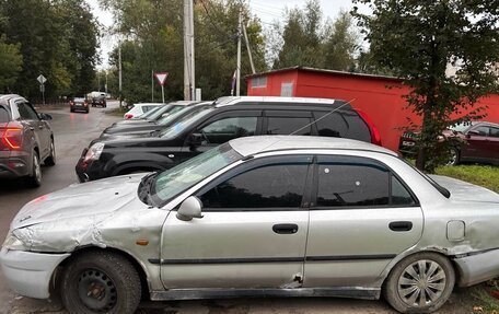 Mitsubishi Carisma I, 1998 год, 55 000 рублей, 2 фотография