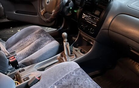 Mazda 323, 1999 год, 110 000 рублей, 6 фотография