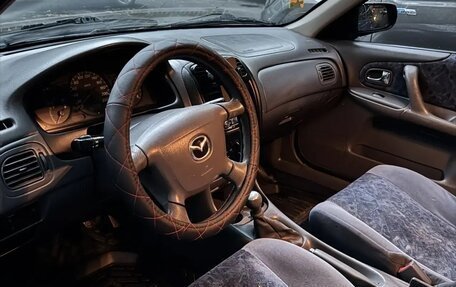 Mazda 323, 1999 год, 110 000 рублей, 7 фотография