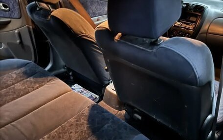 Mazda 323, 1999 год, 110 000 рублей, 11 фотография