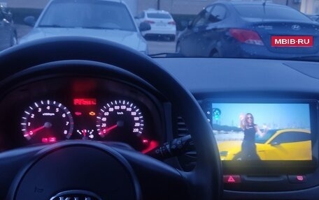 KIA Rio II, 2011 год, 610 000 рублей, 6 фотография