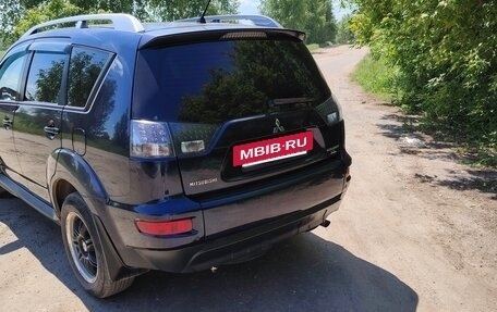 Mitsubishi Outlander III рестайлинг 3, 2010 год, 930 000 рублей, 2 фотография