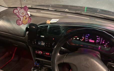 Mitsubishi Mirage VI рестайлинг, 1999 год, 220 000 рублей, 9 фотография