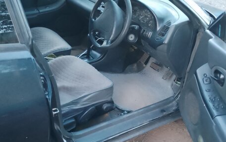 Mazda Lantis, 1994 год, 150 000 рублей, 9 фотография
