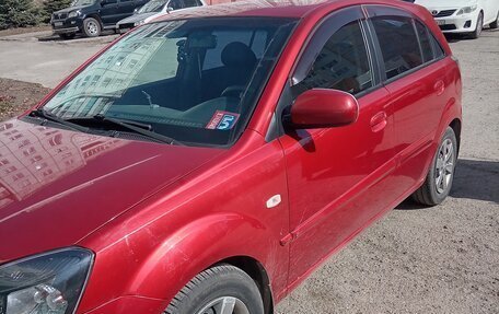KIA Rio II, 2011 год, 635 000 рублей, 3 фотография