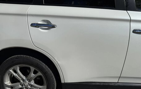Mitsubishi Outlander III рестайлинг 3, 2013 год, 1 390 000 рублей, 9 фотография