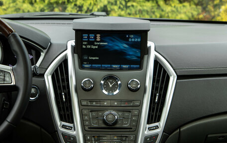 Cadillac SRX II рестайлинг, 2011 год, 503 000 рублей, 11 фотография