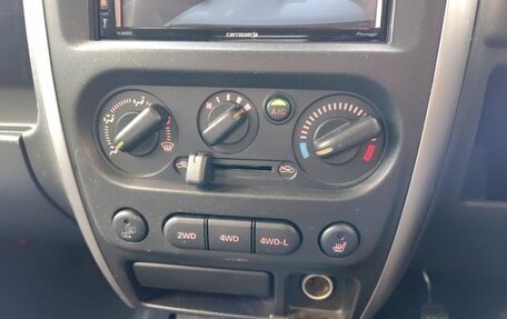 Suzuki Jimny, 2012 год, 1 127 000 рублей, 26 фотография