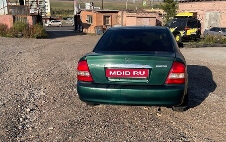 Mazda Protege, 1999 год, 188 000 рублей, 9 фотография