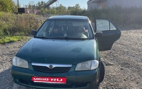 Mazda Protege, 1999 год, 188 000 рублей, 12 фотография