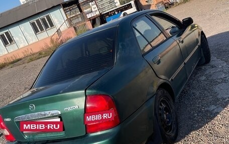 Mazda Protege, 1999 год, 188 000 рублей, 11 фотография
