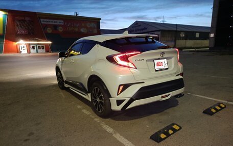 Toyota C-HR I рестайлинг, 2017 год, 1 800 000 рублей, 30 фотография