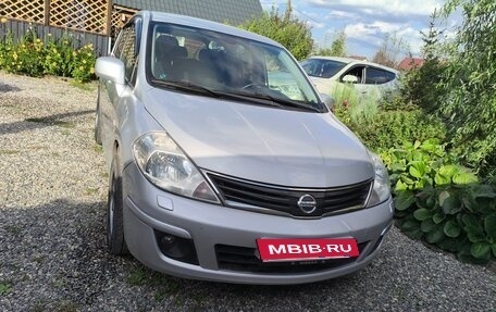 Nissan Tiida, 2010 год, 735 000 рублей, 4 фотография