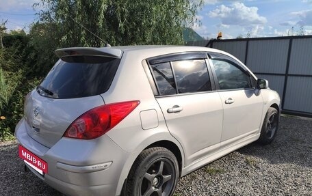 Nissan Tiida, 2010 год, 735 000 рублей, 7 фотография