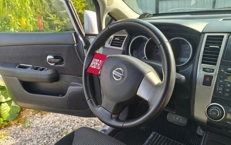 Nissan Tiida, 2010 год, 735 000 рублей, 9 фотография
