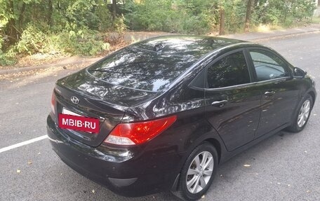 Hyundai Solaris II рестайлинг, 2011 год, 685 000 рублей, 14 фотография