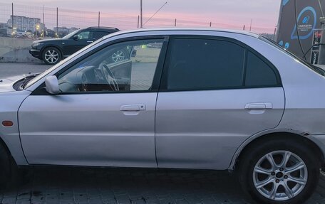 Mitsubishi Lancer VII, 1999 год, 135 000 рублей, 5 фотография