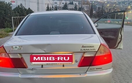 Mitsubishi Lancer VII, 1999 год, 135 000 рублей, 14 фотография