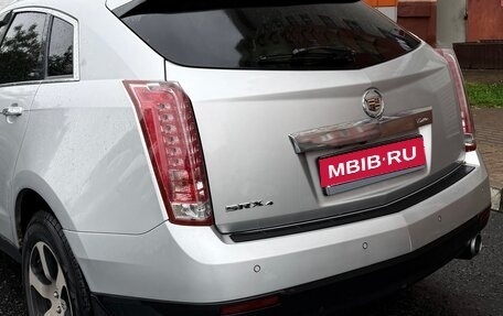 Cadillac SRX II рестайлинг, 2011 год, 950 000 рублей, 1 фотография