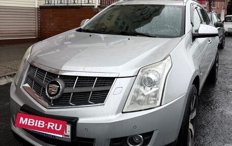 Cadillac SRX II рестайлинг, 2011 год, 950 000 рублей, 3 фотография