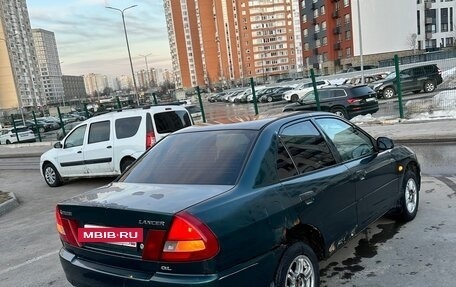 Mitsubishi Lancer VII, 1997 год, 135 000 рублей, 8 фотография