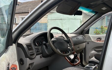 KIA Carnival III, 2005 год, 400 000 рублей, 10 фотография
