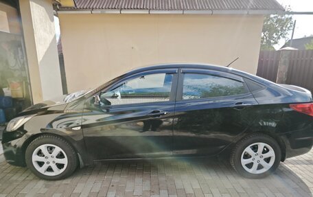 Hyundai Solaris II рестайлинг, 2011 год, 610 000 рублей, 4 фотография
