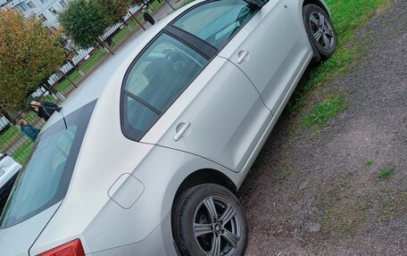 Skoda Rapid I, 2014 год, 890 000 рублей, 3 фотография