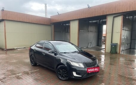 KIA Rio III рестайлинг, 2012 год, 750 000 рублей, 2 фотография