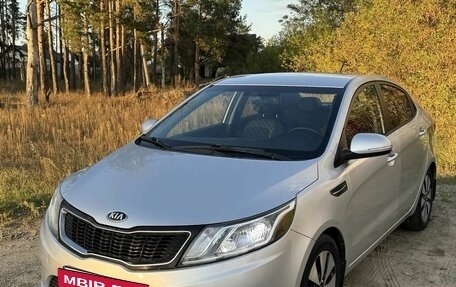 KIA Rio III рестайлинг, 2013 год, 750 000 рублей, 10 фотография