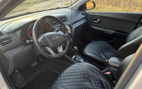 KIA Rio III рестайлинг, 2013 год, 750 000 рублей, 21 фотография