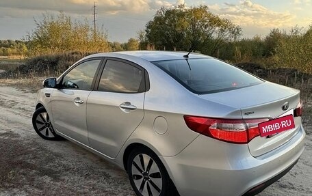 KIA Rio III рестайлинг, 2013 год, 750 000 рублей, 20 фотография