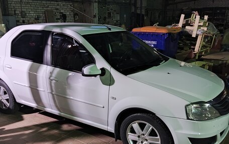Renault Logan I, 2013 год, 700 000 рублей, 2 фотография