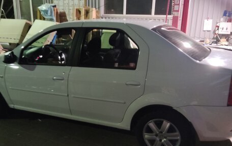 Renault Logan I, 2013 год, 700 000 рублей, 3 фотография