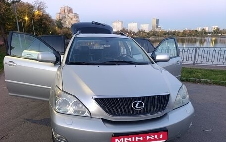 Lexus RX II рестайлинг, 2006 год, 1 000 000 рублей, 23 фотография