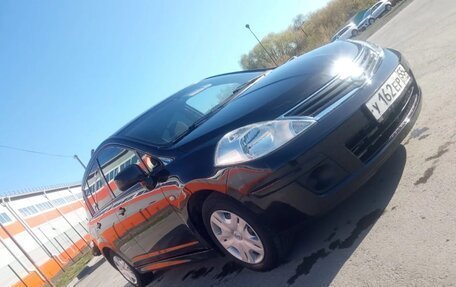 Nissan Tiida, 2010 год, 750 000 рублей, 2 фотография