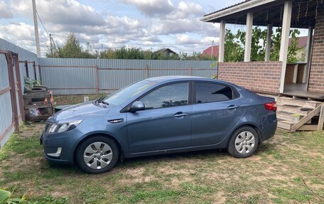 KIA Rio III рестайлинг, 2012 год, 750 000 рублей, 2 фотография