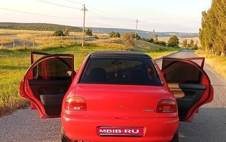 Mazda 121 II, 1995 год, 245 000 рублей, 3 фотография