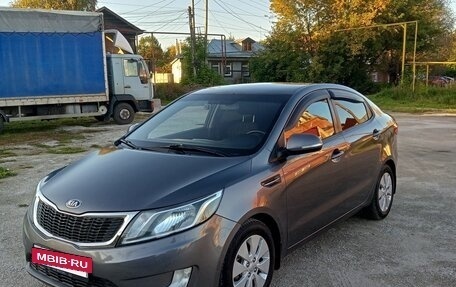 KIA Rio III рестайлинг, 2013 год, 750 000 рублей, 2 фотография
