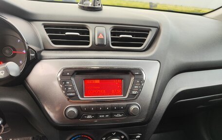 KIA Rio III рестайлинг, 2013 год, 750 000 рублей, 23 фотография