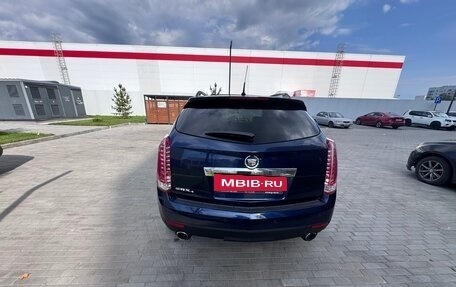 Cadillac SRX II рестайлинг, 2011 год, 850 000 рублей, 10 фотография