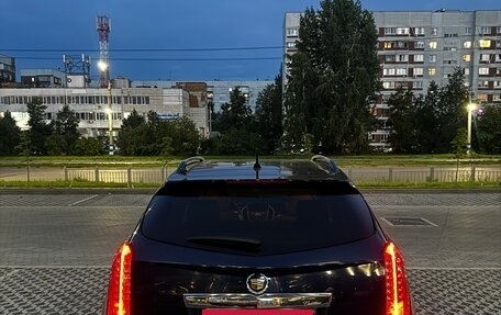 Cadillac SRX II рестайлинг, 2011 год, 850 000 рублей, 3 фотография