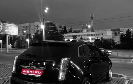 Cadillac SRX II рестайлинг, 2011 год, 850 000 рублей, 2 фотография