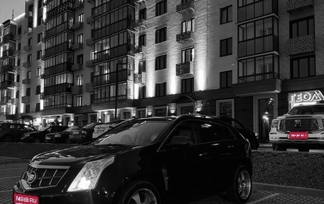 Cadillac SRX II рестайлинг, 2011 год, 850 000 рублей, 1 фотография