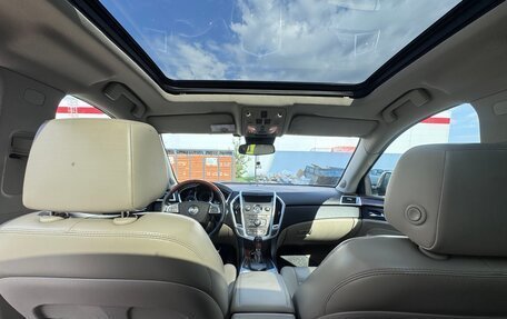 Cadillac SRX II рестайлинг, 2011 год, 850 000 рублей, 32 фотография