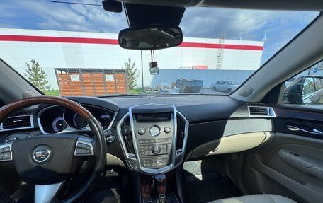 Cadillac SRX II рестайлинг, 2011 год, 850 000 рублей, 31 фотография