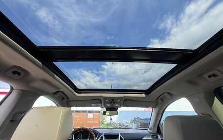 Cadillac SRX II рестайлинг, 2011 год, 850 000 рублей, 33 фотография