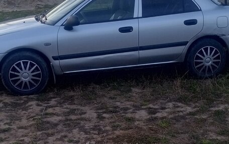 Mitsubishi Carisma I, 2003 год, 155 000 рублей, 2 фотография